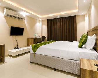 Treebo Iffco Chowk - Gurugram - Bedroom