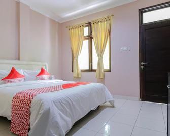 OYO 2456 Purnama House Kuta - Kuta - Habitación