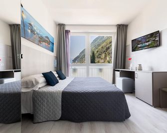 فندق Canarino - ريفا ديل غاردا - غرفة نوم