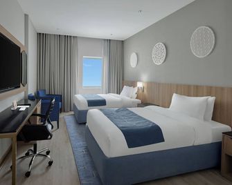 Makarem Umm Al Qura Hotel - מכה - חדר שינה
