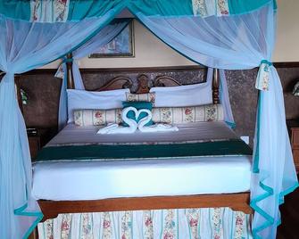 Clarridge View Villa. A view of the Caribbean sea. - Montego Bay - Bedroom