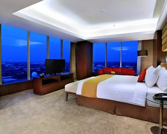 Aston Madiun Hotel & Conference Center - Madiun - Schlafzimmer