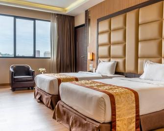 M One Hotel - Batam - Bedroom