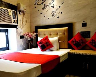 City Hotel - Prayagraj - Slaapkamer