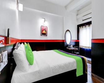 Treebo Benaka Residency - Chikmagalur - Спальня