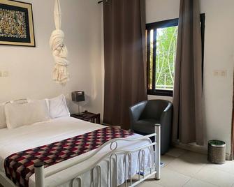 Pension Les Palmiers - Conakry - Bedroom
