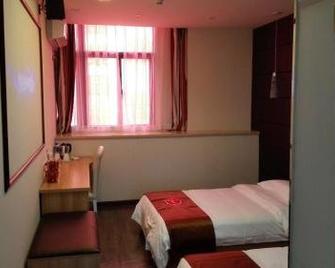 Thank Inn Chain Hotel Anhui Huoshan West Piyuan Road - Lu’an - Bedroom