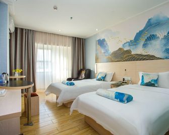 Qicheng Hotel (Shenzhen Gongming Heshuikou Metro Station Branch) - Dongguan - Habitación