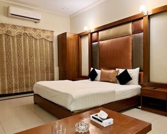 The Grand Hotel Multan - Multān - Camera da letto