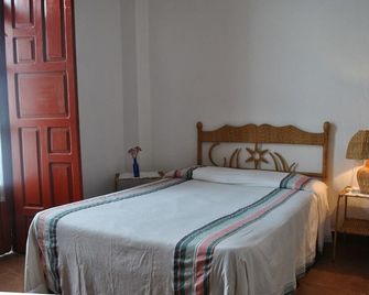 Posada de San Agustin - פצקוארו - חדר שינה