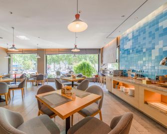 Home Inn Neo (Zibo Badaju Mixc Railway Station Branch) - Zibo - Restaurante