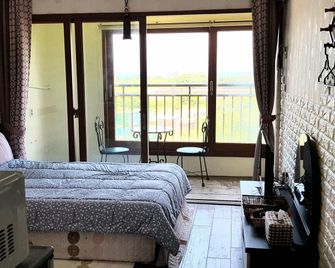 جون هاوس - دار ضيافة - جيجو - غرفة نوم