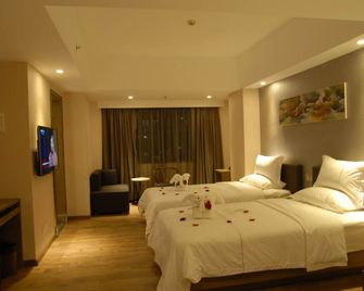 Insail Hotels (Guangyuanxincun Jingtai Pedestrian Street Guangzhou) - גואנגג'ואו - חדר שינה