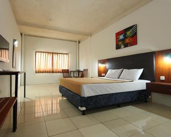Hotel Augusta Lembang - Lembang - Slaapkamer
