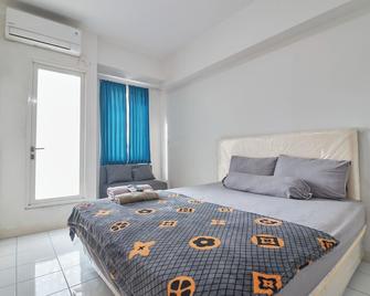 Room Rendi Podomoro Golf View - Depok - Habitación