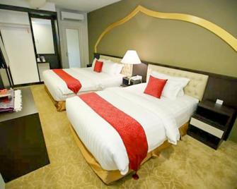 Al Khatiri Hotel - Kota Bahru - Schlafzimmer
