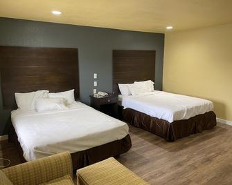 Woodridge Inn and Suites - Miami - Ložnice