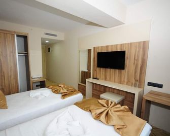 Grand Hekimoglu Hotels - Izmir - Schlafzimmer