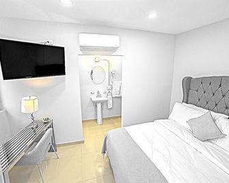 Árbol Suites - Tijuana - Bedroom