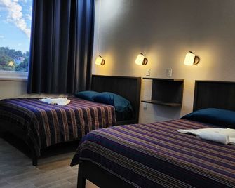 Maya Bella Downtown Hotel - San Ignacio - Schlafzimmer