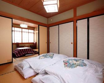 Minshuku Kojima - Nozawa Onsen - Bedroom