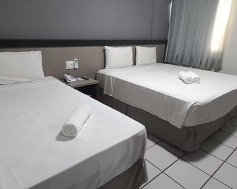 فندق ناسيونال إن مطار ريسيفي - رسفى - غرفة نوم