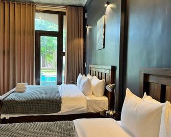 Stone Age Resort - Кампот - Спальня