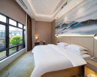 Gem Hotel (Chizhou High-Speed Railway Station) - Chizhou - Schlafzimmer