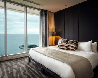 جراند بابيوا هوتل، أميمبر أوف راديسون إنديفيجوالز - بورت مورسبي - غرفة نوم