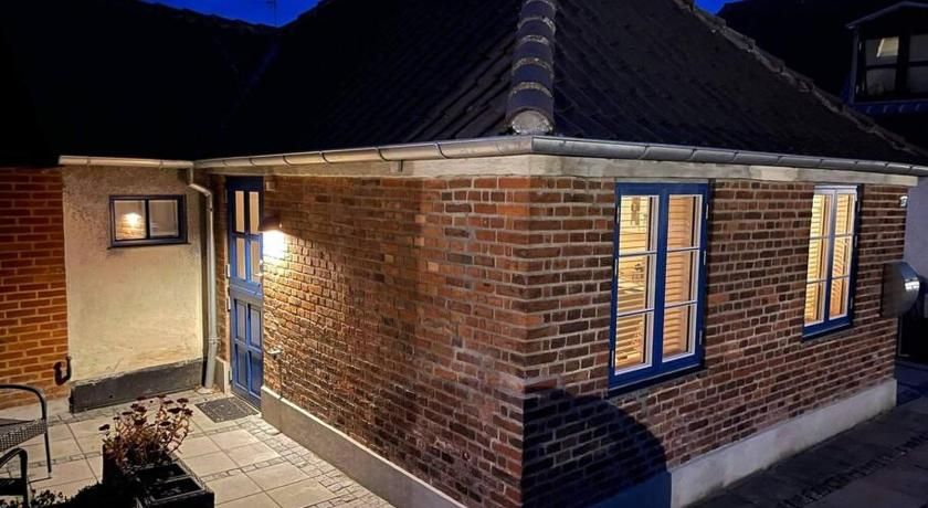 Hyggeligt lille byhus lige mellem havnen og bytorv – Ringkøbing