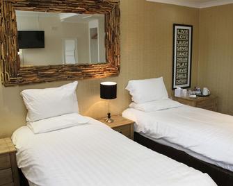 Honest Lawyer Hotel - Durham - Schlafzimmer