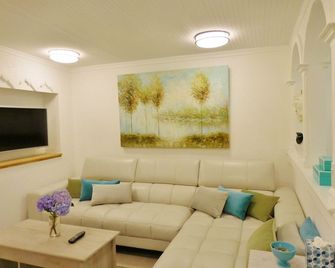 The Cottage - Monticello - Wohnzimmer