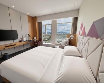Borrman Hotel Kunming Changshui Airport Center - Kunming - Habitación