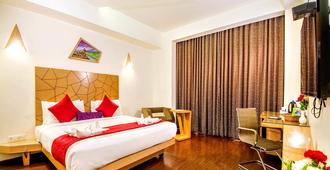 Rockdale Clarks Inn Suites - Vishakhapatnam - Slaapkamer