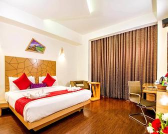 Rockdale Clarks Inn Suites - Visakhapatnam - Bedroom