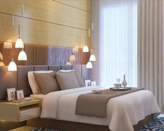 Bess Mansion Hotel Surabaya - Soerabaja - Slaapkamer