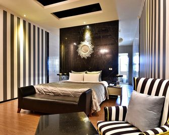 Vogue Boutique Motel - Taoyuan City - חדר שינה