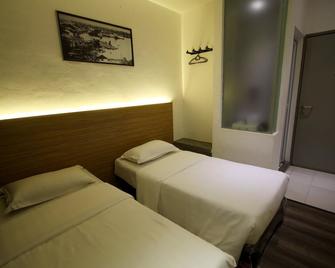 Place2stay @ Chinatown - Kuching - Camera da letto