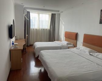 Home Inn Paibai Yun Hotel (Taizhou Wanda Plaza) - Taizhou - Habitación