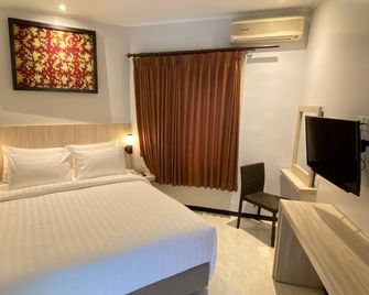 Tuwuh Hotel at Kayutangan Malang - Malang - Bedroom