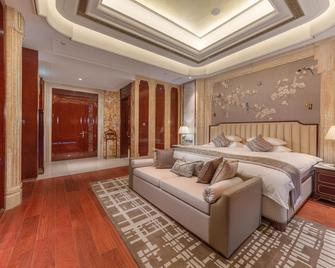 New Century Grand Hotel Zunyi - Zunyi - Bedroom