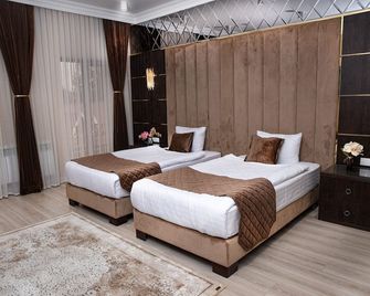 ماروكاند سبا هوتل - سمرقند - غرفة نوم