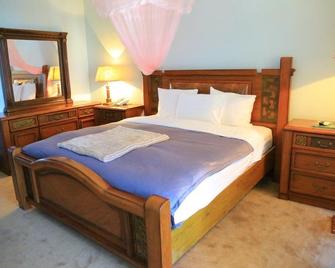 Serene Suites Hotel - Kampala - Bedroom