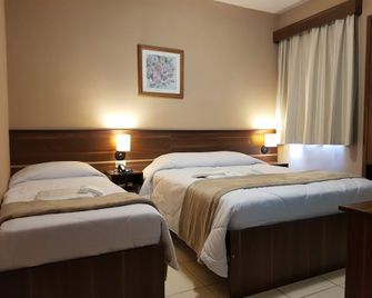 أسترو هوتل - ساو خوسيه دوس كامبوس - غرفة نوم