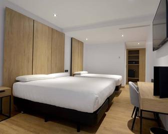 AHM Aparthotel Marcenado - מדריד - חדר שינה