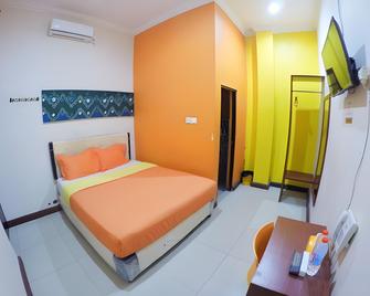 Hotel Ashofa - Perumahan Angkatan Udara - Bedroom