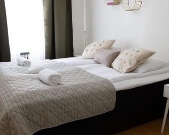 2 ندهومز تشارمينج 2 دروم هوم بوي بلكوني - هيلسينكي - غرفة نوم