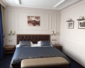 Hotel Oktyabrskaya - Ulyanovsk - Slaapkamer
