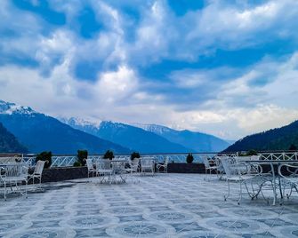 Hotel Mountain Top - Manali - Hàng hiên