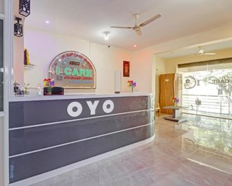 Hotel O I Care With Greenery Comforts - Tumkūr - Front desk